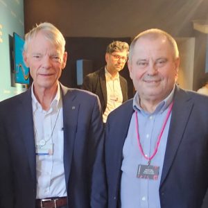 Prof. Alojzy Z. Nowak, the UW Rector, with Prof. Michael Spence at Belgium House. Credit UW